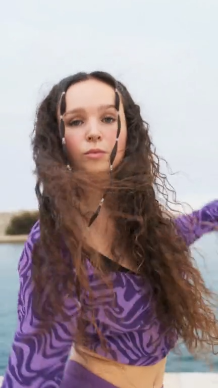 Wind Goddess face swap template with flowing hair and dramatic vibe.
